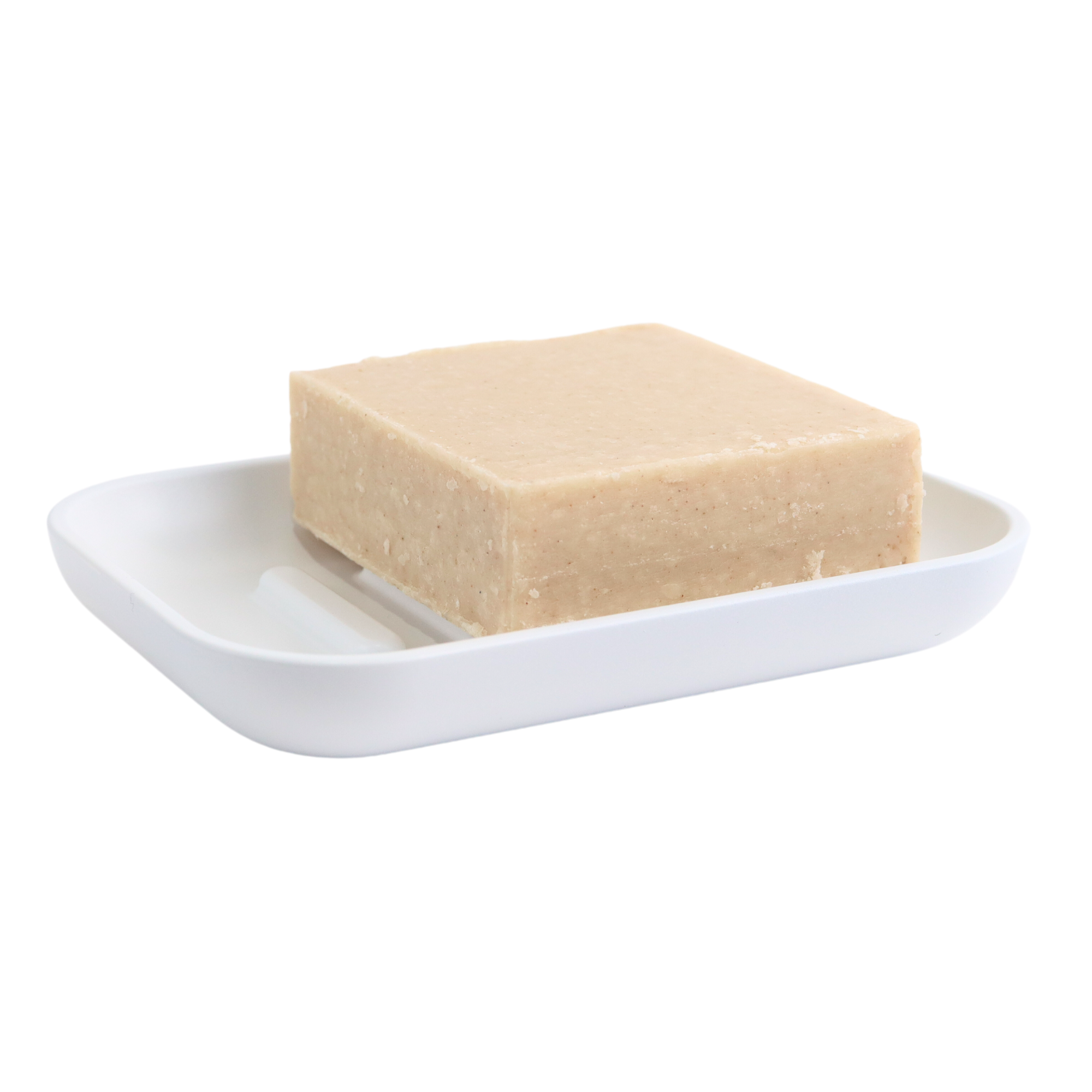 White colored soap dish with soap