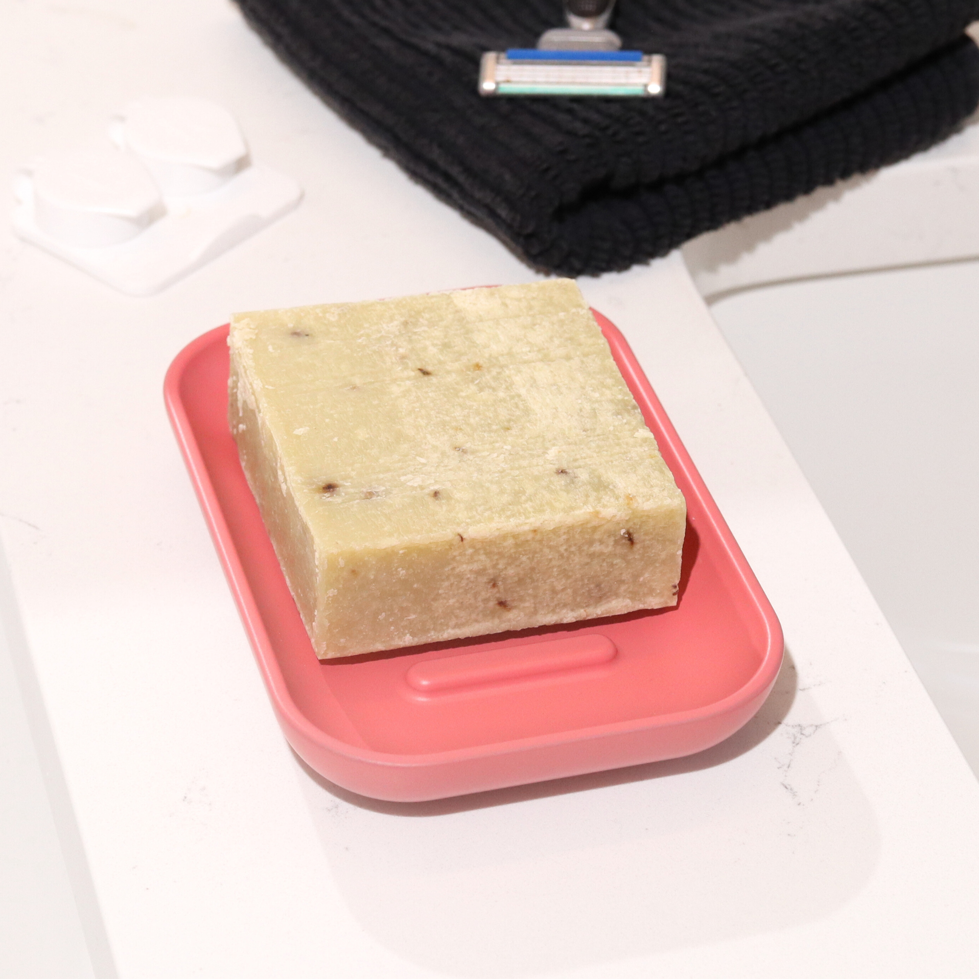 Pink colored soap dish for shower