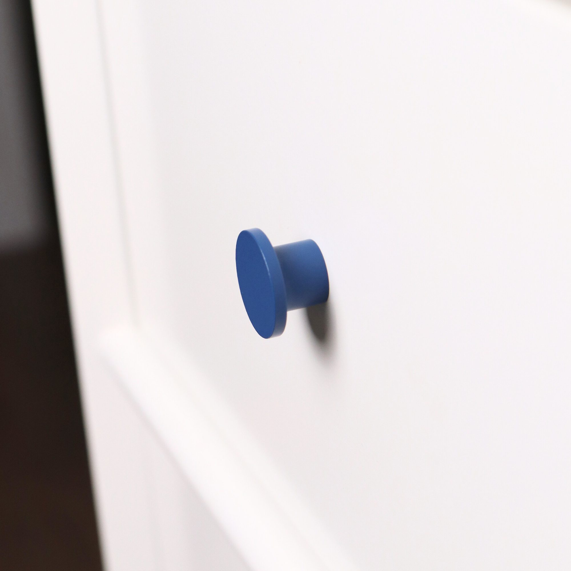 Blue round knob