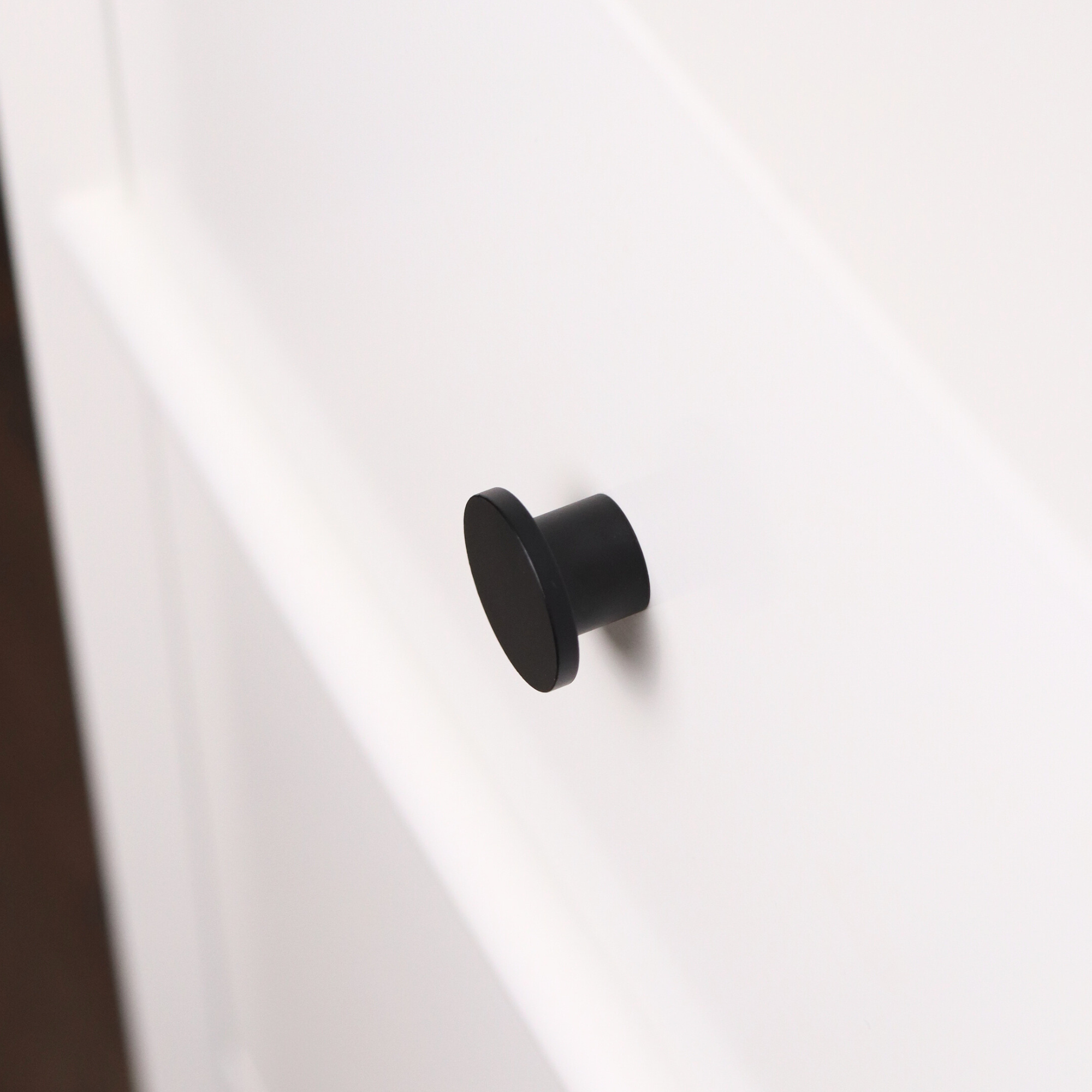 Black round knob