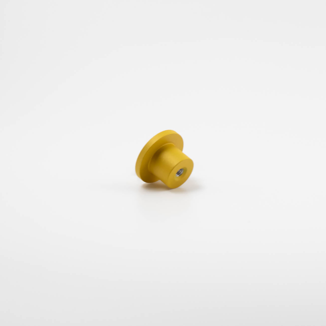 Yellow mid-century modern round knob