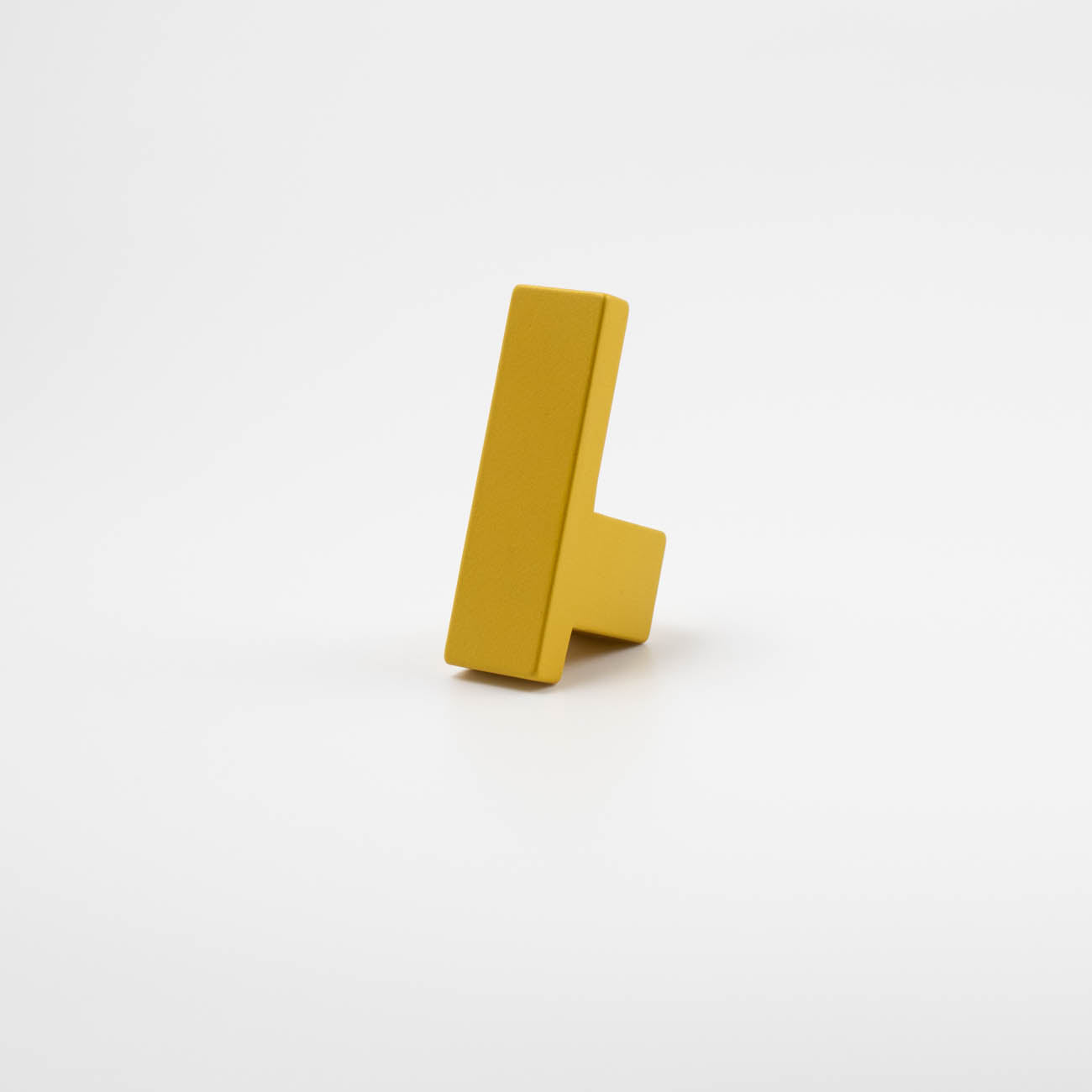 Yellow art deco l-bar knob